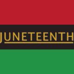 A flag with red, black and green horizontal stripes with the word “Juneteenth” in yellow on the black stripe.