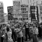 Protestors display religious slogans at Atlanta's Pride Parade in 2017.