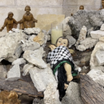 A nativity scene with the baby Jesus under the rubble in Gaza.