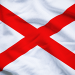 A ruffled state flag of Alabama.