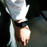 A man with a smartwatch on his wrist.