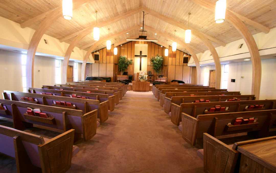 A photo of a small, empty church sanctuary.