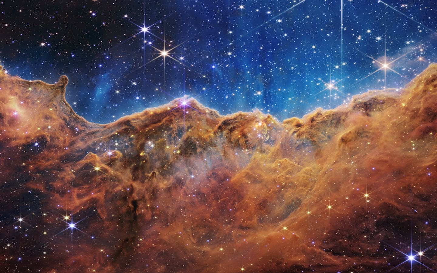 The “Cosmic Cliffs” in the Carina Nebula