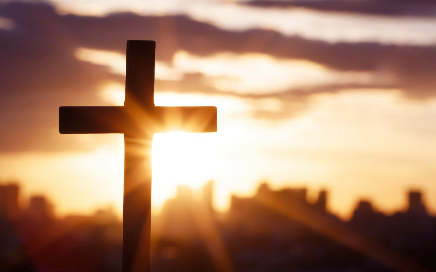 A cross lit by the sun.